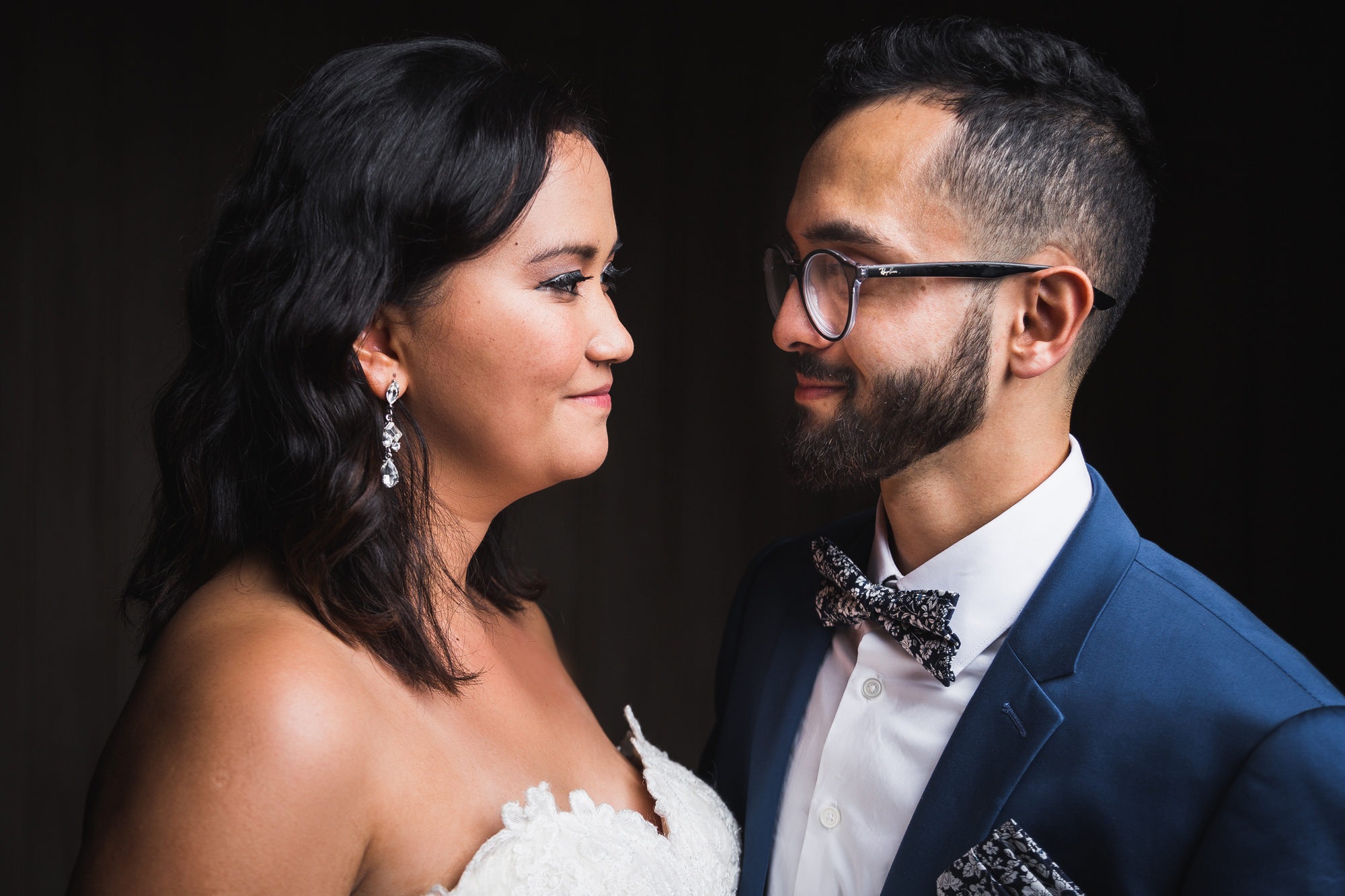 bride and groom posing low key photograhy